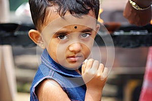 Young girl starring at the camera in Sri Lanka