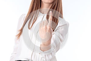 Young girl is stretched out in front of hand and shows one finger isolated on white background