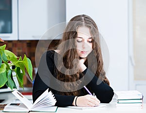 The young girl is studing