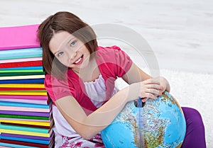 Young girl with study materials