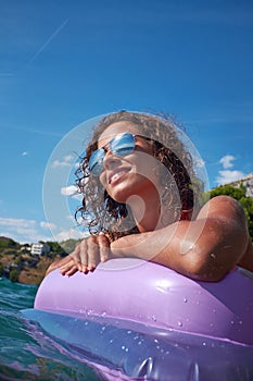 Young girl sunbathing on Adriatic waters