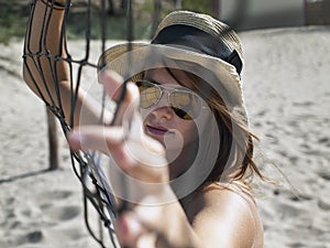 Young girl in sunglasses.