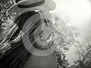 Young girl in sunglasses.