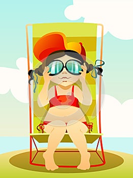 Young girl in sunglasses on a beach