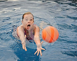 Young girl in swimming pool