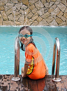 Young girl at swimming pool