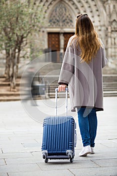 Young girl taking a journey in the city