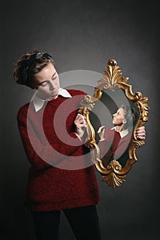 Young girl talks with her conscience photo