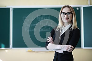 Young girl teacher in primary school