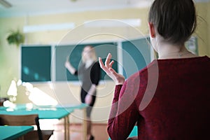 Young girl teacher in primary school