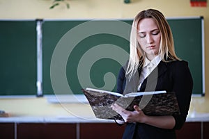 Young girl teacher in primary school