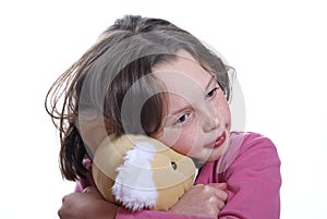 Young girl and teddy bear