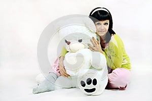 Young girl with teddy bear