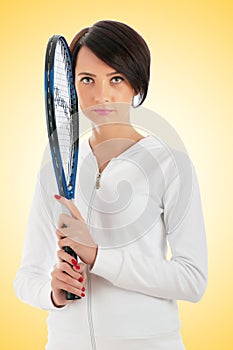 Young girl with tennis racket and bal isolated