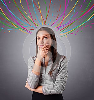 Young girl thinking with colorful abstract lines