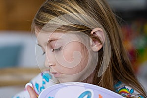 Young girl with thoughtful expression