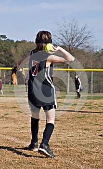 Young Girl Throwing Softball