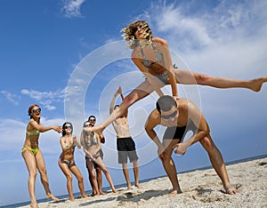 Young girl to jump across her boyfriend photo