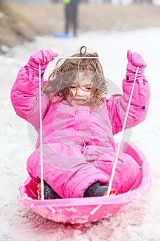 Young Girl Tobogganing