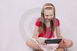 Young girl with touch tablet