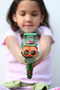 Young Girl With Toy Gun