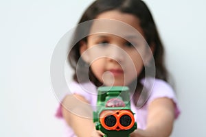 Young Girl With Toy Gun