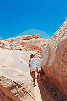 Young girl on trail at Fire Valley in Utah