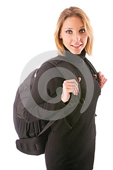 Young girl-traveller with big black backpack