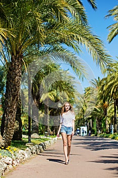 Young girl on a tropical resort