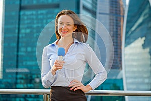 Young girl TV reporter is broadcasting photo