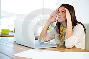 Young girl uses his computer