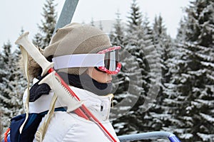 Young girl using cable car, ski resort Kopaonik