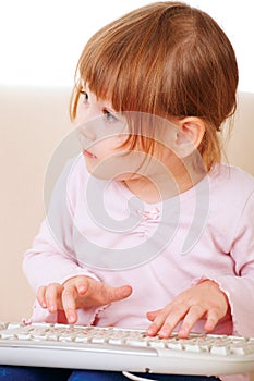 Young girl using a keybord. computer generation
