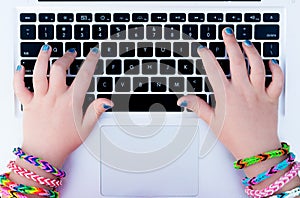 Young girl using the laptop