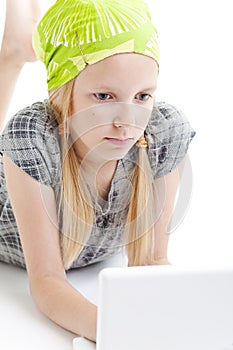 Young girl using a laptop computer