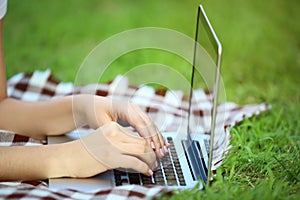 Young girl using laptop computer