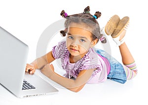 Young girl using notebook computer