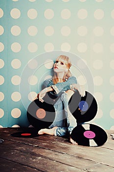 Young girl with vinyl records