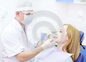 Young girl visit to the dentist