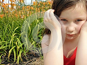 Young Girl With Vivid orange Flowers