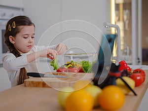 Young Girl Vlogger Making Social Media Video About Cooking For Internet At Home