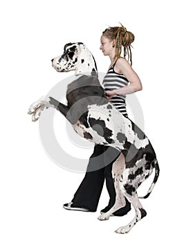 Young girl walking his dog (Great dane 4 years) ha