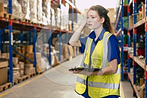 Young girl warehouse employee shocked face while working mistake feel stressed anxiety and worry fear guilty gusture worker