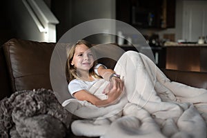 Young girl watching television