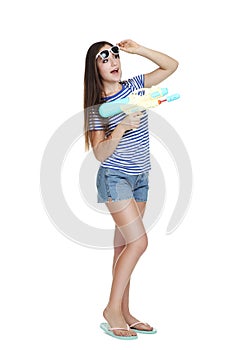 Young girl with water gun