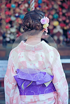 Young girl wearing a kimono