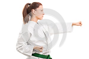 Young girl wearing kimono in combat stance