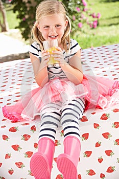 Young Girl Wearing Pink Wellington Boots