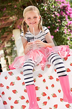 Young Girl Wearing Pink Wellington Boots