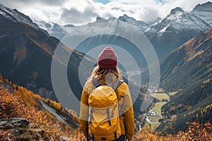 Young girl wearing a vibrant yellow jacket, arriving at the end of the hike, representing the spirit of adventure, accomplishment
